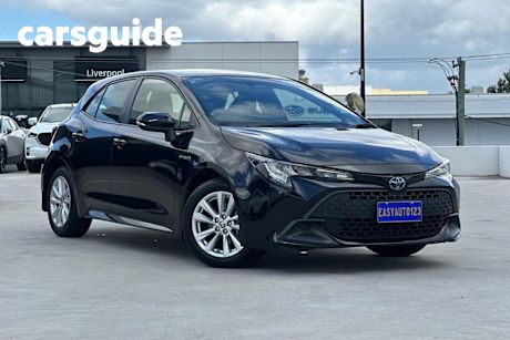 Black 2023 Toyota Corolla Hatchback Ascent Sport + Conv PK Hybrid