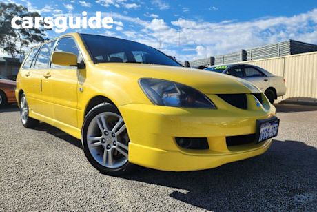 Yellow 2005 Mitsubishi Lancer Sedan VR-X