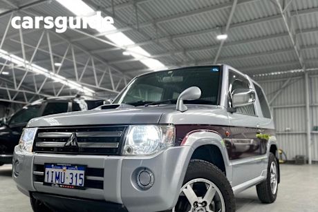 Silver 2011 Mitsubishi Pajero Mini SUV