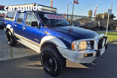 Blue 2004 Nissan Navara Dual Cab Pick-up ST-R (4X4)