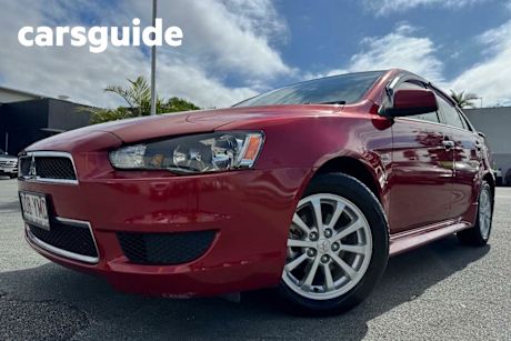 Red 2012 Mitsubishi Lancer Sedan LX