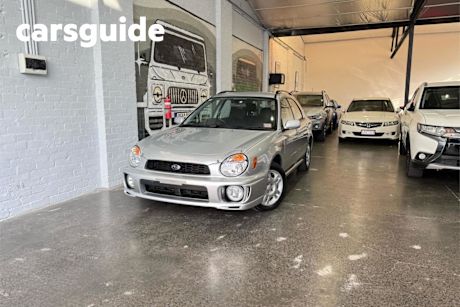 Blue 2002 Subaru Impreza Hatchback GX (awd)