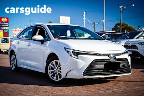 White 2024 Toyota Corolla Sedan Ascent Sport HEV