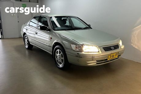 Gold 2002 Toyota Camry Sedan Conquest