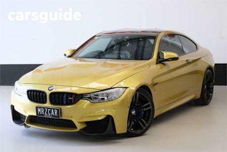 Yellow 2016 BMW M4 Coupe