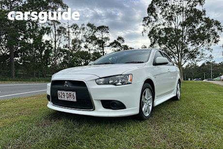 White 2013 Mitsubishi Lancer Sedan ES