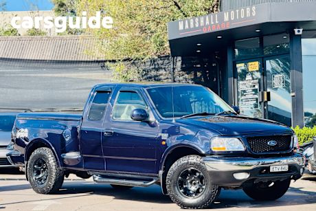 Blue 1999 Ford F150 Ute Tray