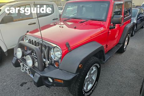 Red 2010 Jeep Wrangler Softtop Sport (4X4)