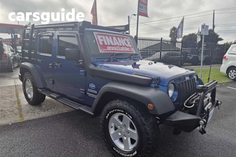 Blue 2010 Jeep Wrangler Softtop Unlimited Sport (4X4)