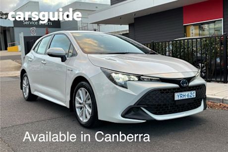 White 2023 Toyota Corolla Hatchback Ascent Sport + Conv PK Hybrid