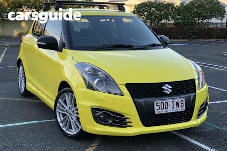 Yellow 2016 Suzuki Swift Hatchback Sport Navigator