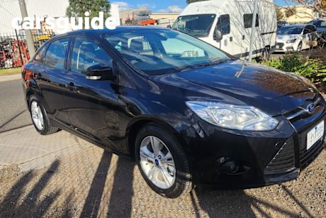 Black 2015 Ford Focus Sedan Trend