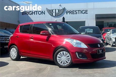 Red 2014 Suzuki Swift Hatchback GL Navigator