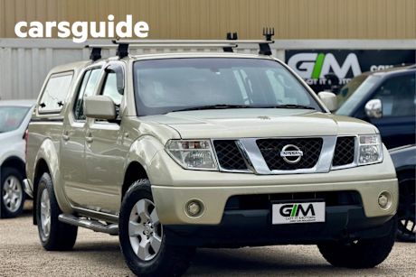 Yellow 2010 Nissan Navara Dual Cab Pick-up ST (4X4)