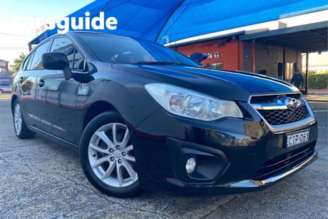 Black 2012 Subaru Impreza Hatchback 2.0I-L (awd)