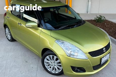Yellow 2013 Suzuki Swift Hatchback RE.2
