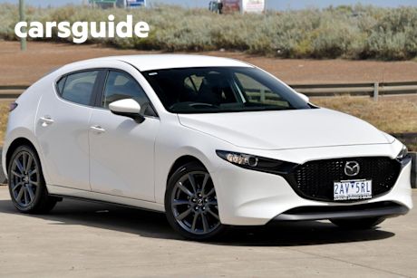 White 2024 Mazda 3 Sedan G20 Evolve