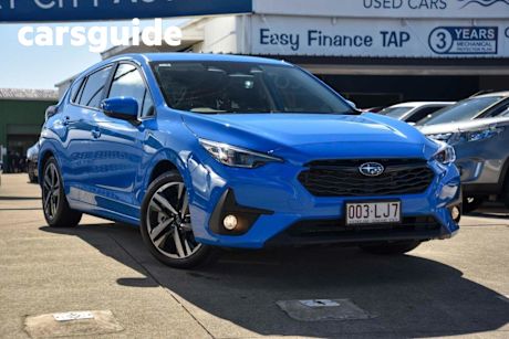 Blue 2024 Subaru Impreza Hatchback 2.0L (awd)