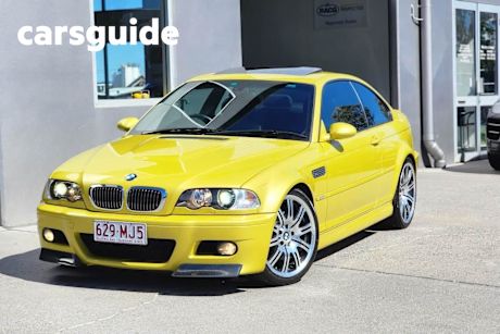 Yellow 2003 BMW M3 Coupe