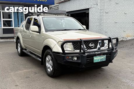 Gold 2011 Nissan Navara Dual Cab Pick-up ST (4X4)