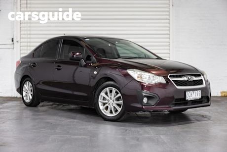 Red 2012 Subaru Impreza Sedan 2.0I-L (awd)