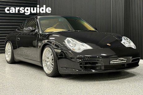 Black 2002 Porsche 911 Coupe Carrera