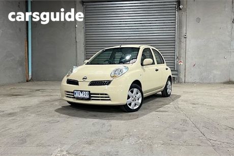 Yellow 2009 Nissan Micra Hatchback