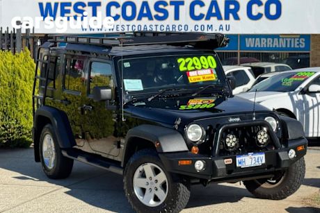 Black 2014 Jeep Wrangler Unlimited Softtop Freedom (4X4)