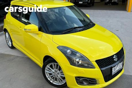 Yellow 2016 Suzuki Swift Hatchback Sport Navigator
