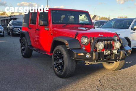 Red 2017 Jeep Wrangler Unlimited Softtop Sport (4X4)