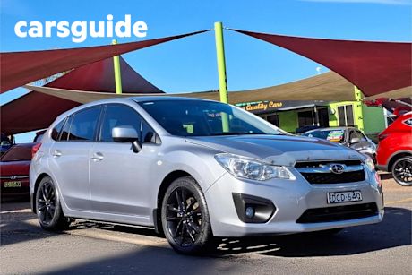 Silver 2012 Subaru Impreza Hatchback 2.0I-L (awd)