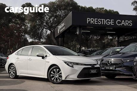 White 2021 Toyota Corolla Sedan Ascent Sport (hybrid)