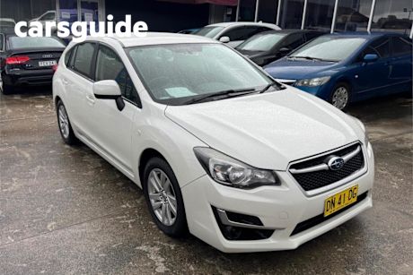 White 2015 Subaru Impreza Hatchback 2.0I (awd)