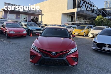 Red 2019 Toyota Camry Sedan Ascent Sport (hybrid)