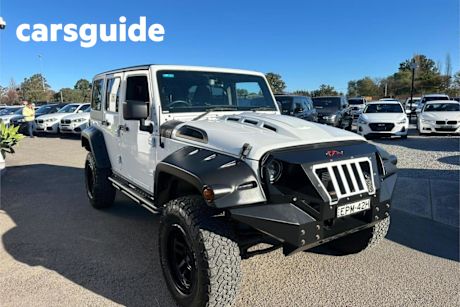 White 2019 Jeep Wrangler Unlimited Softtop Sport S (4X4)