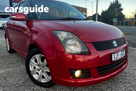 Red 2009 Suzuki Swift Hatchback RE.3