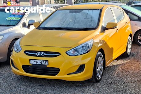 Yellow 2015 Hyundai Accent Hatchback Active