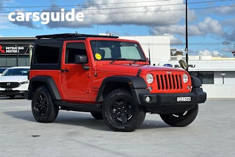 Orange 2015 Jeep Wrangler Hardtop Renegade Sport (4X4)