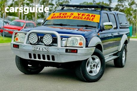 Blue 2006 Nissan Navara Dual Cab Pick-up DX (4X4)
