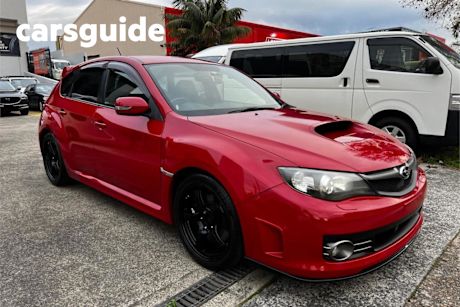 Red 2009 Subaru Impreza Hatchback WRX STI-R
