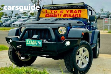 Blue 2009 Jeep Wrangler Hardtop Unlimited Renegade (4X4)