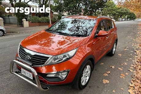 Orange 2013 Kia Sportage Wagon SLI (awd)