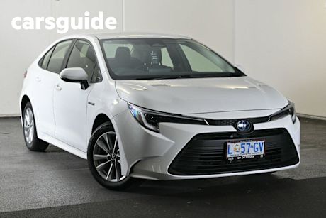 White 2023 Toyota Corolla Sedan Ascent Sport Hybrid