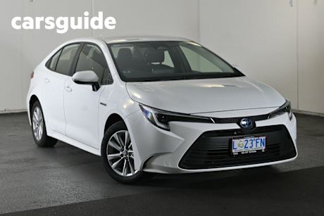 White 2023 Toyota Corolla Sedan Ascent Sport Hybrid
