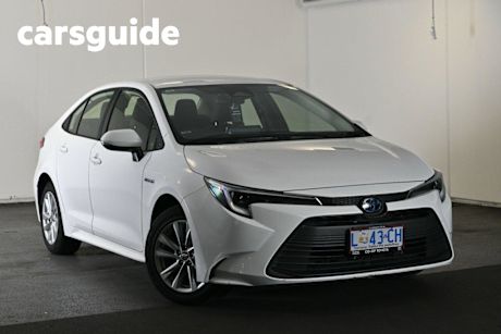 White 2023 Toyota Corolla Sedan Ascent Sport Hybrid