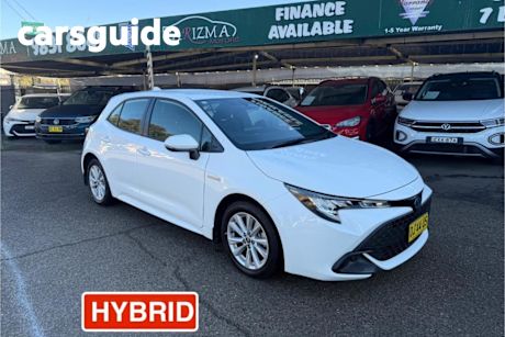 White 2023 Toyota Corolla Hatchback Ascent Sport Hybrid