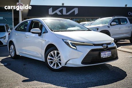 White 2023 Toyota Corolla Sedan Ascent Sport Hybrid