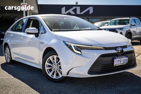 White 2023 Toyota Corolla Sedan Ascent Sport Hybrid