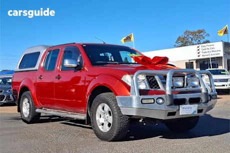Red 2009 Nissan Navara Dual Cab Pick-up ST-X (4X4)