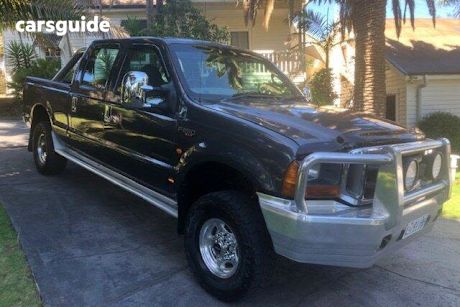 Grey 2003 Ford F250 Crew Cab Pickup XLT (4X4)